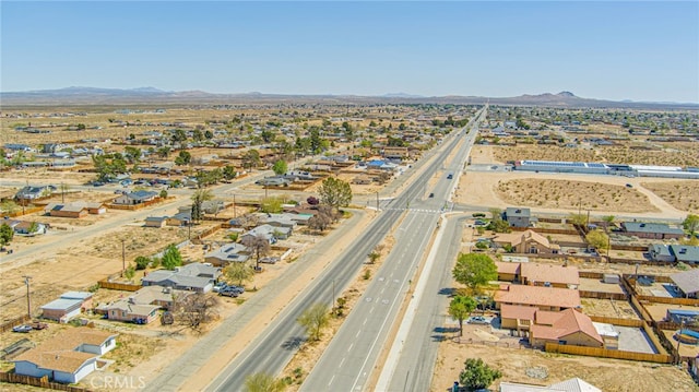 drone / aerial view featuring a mountain view