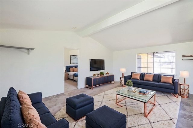 living area featuring lofted ceiling with beams