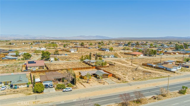 bird's eye view featuring a residential view and a mountain view