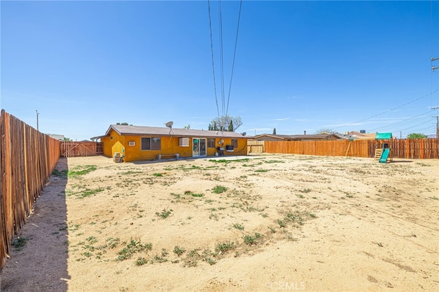 view of yard with a patio and a fenced backyard