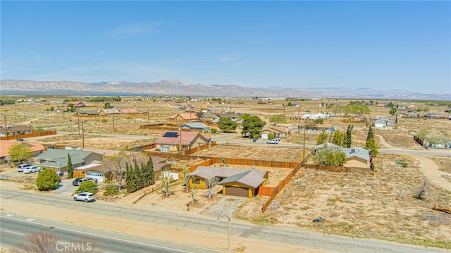 drone / aerial view featuring a mountain view and a residential view