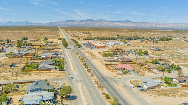 aerial view with a mountain view and a desert view