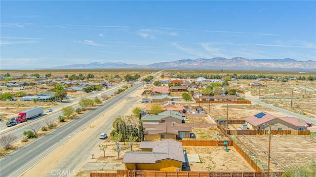 aerial view with a mountain view and a residential view