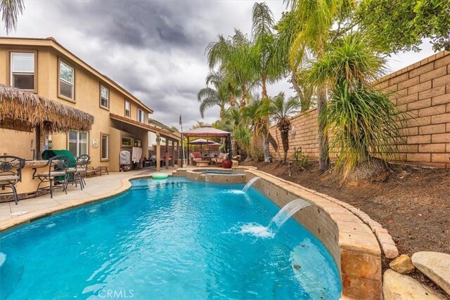 29567 Cool Meadow Dr, Menifee, CA 92584 - view of swimming pool with a gazebo, a patio area, and a pool with connected hot tub