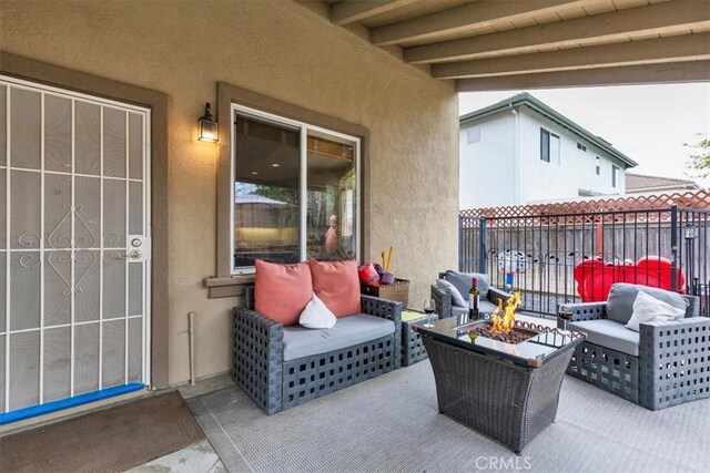 29567 Cool Meadow Dr, Menifee, CA 92584 - view of patio featuring an outdoor living space with a fire pit