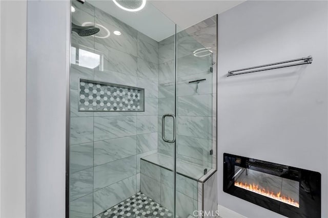 12195 Monte Vista Ave, Chino, CA 91710 - full bathroom featuring a shower stall and a glass covered fireplace