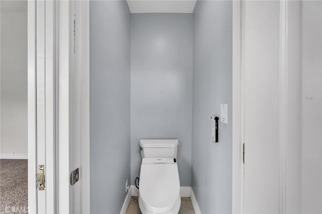 12195 Monte Vista Ave, Chino, CA 91710 - bathroom featuring toilet and baseboards