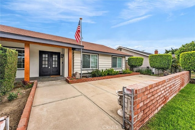 12195 Monte Vista Ave, Chino, CA 91710 - view of front of house with french doors and fence