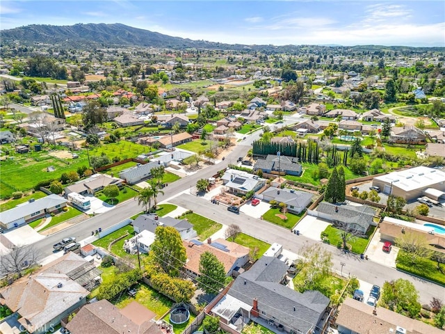 drone / aerial view with a mountain view and a residential view