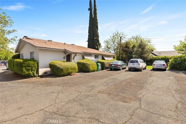 view of property exterior featuring stucco siding
