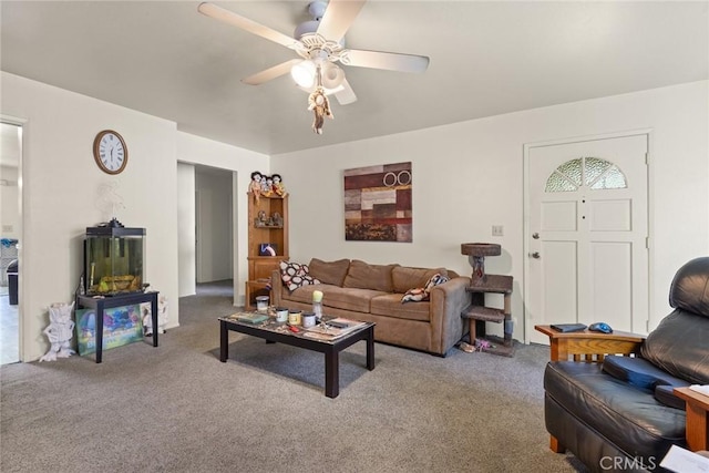 carpeted living area featuring ceiling fan