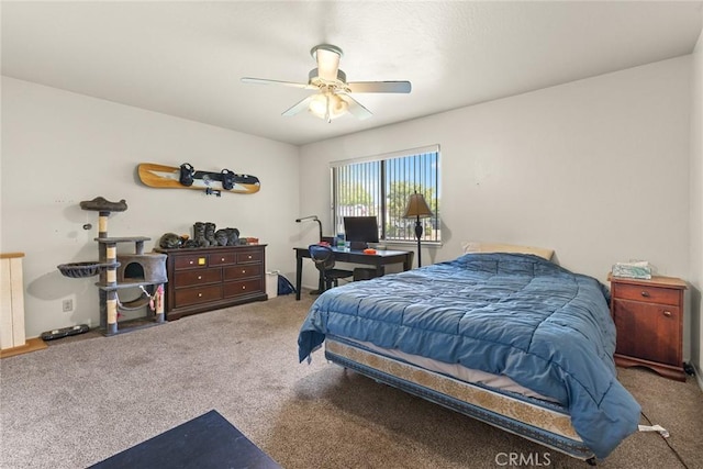 bedroom featuring radiator heating unit, carpet floors, and ceiling fan