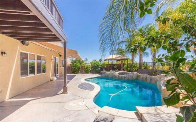 24963 Sunset Vista Ave, Menifee, CA 92584 - view of swimming pool with a fenced backyard and a patio area