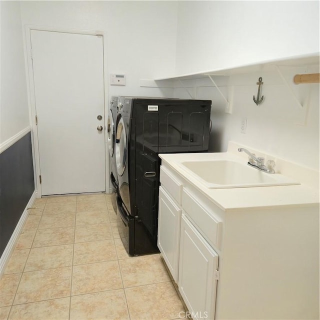 24963 Sunset Vista Ave, Menifee, CA 92584 - laundry room featuring washer and clothes dryer and light tile patterned floors