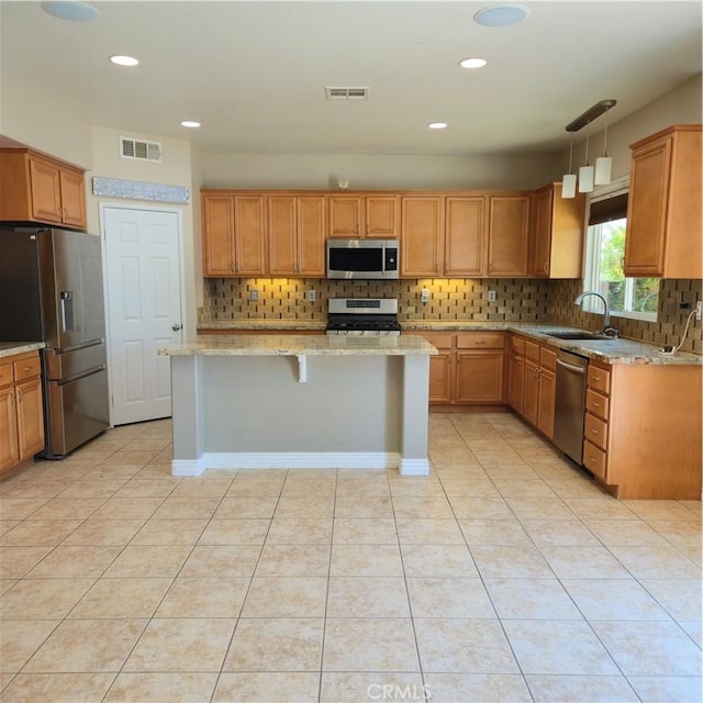 24963 Sunset Vista Ave, Menifee, CA 92584 - kitchen featuring stainless steel appliances, a sink, decorative backsplash, light tile patterned floors, and recessed lighting