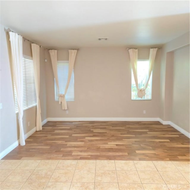 24963 Sunset Vista Ave, Menifee, CA 92584 - unfurnished room featuring light wood-style floors and baseboards