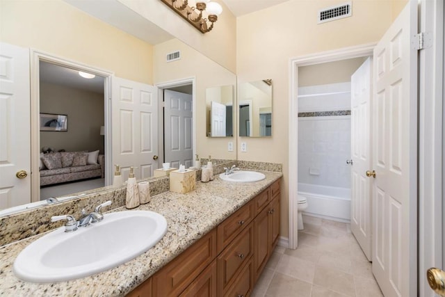 full bathroom featuring a sink, visible vents, and double vanity