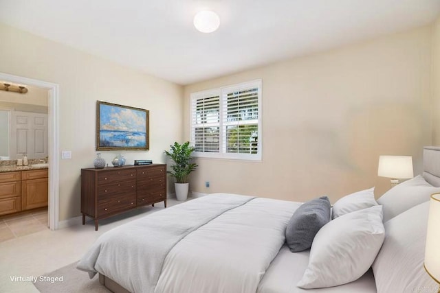 bedroom with connected bathroom
