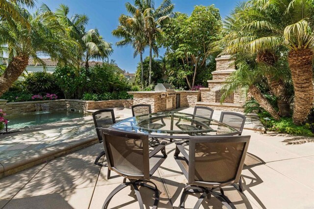 view of patio / terrace with outdoor dining area and area for grilling