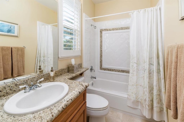 bathroom with shower / tub combo, toilet, and vanity