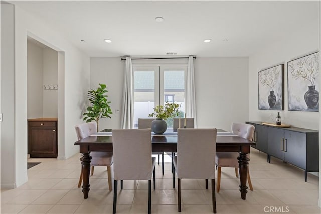 dining space with recessed lighting, light tile patterned floors, and visible vents