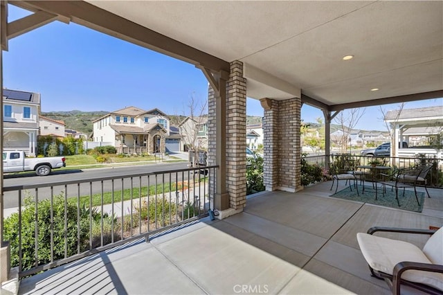 view of patio with a residential view