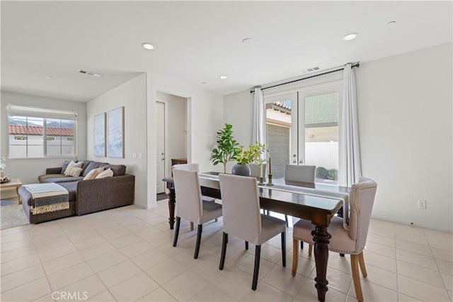 dining space with visible vents, recessed lighting, and light tile patterned floors