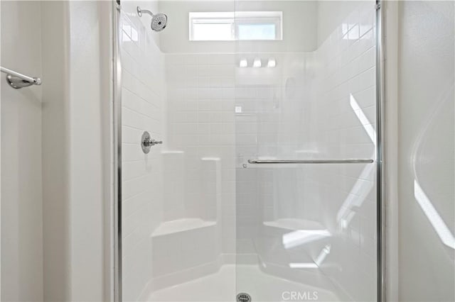 full bathroom with a stall shower
