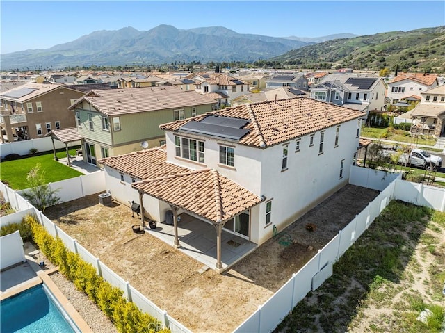 bird's eye view featuring a residential view and a mountain view