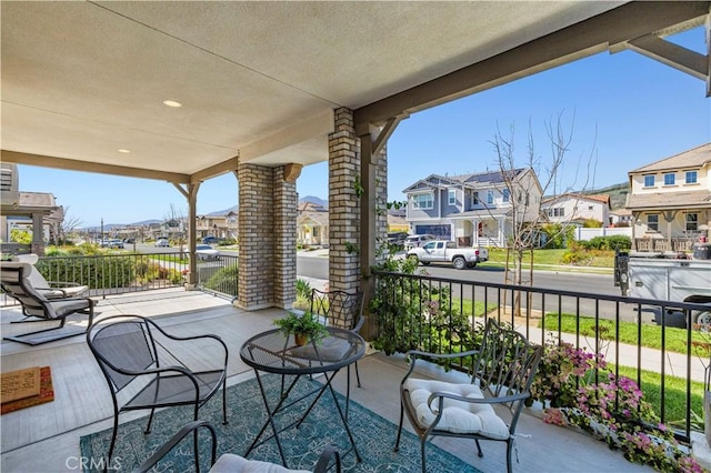 view of patio / terrace featuring a residential view