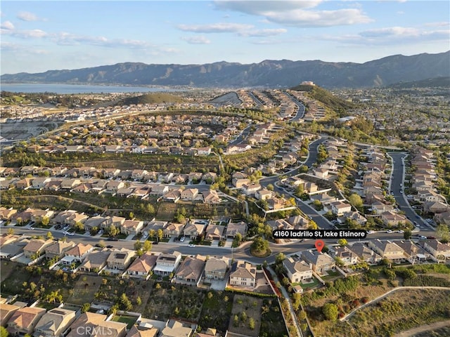 aerial view featuring a mountain view and a residential view
