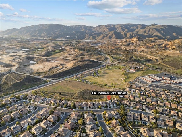 birds eye view of property featuring a residential view and a mountain view