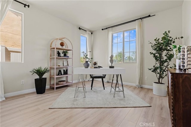 11102 Duran, Jurupa Valley, CA 91752 - office area featuring baseboards and wood finished floors