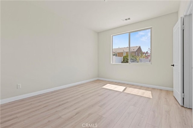 11102 Duran, Jurupa Valley, CA 91752 - unfurnished bedroom with visible vents, baseboards, and light wood finished floors