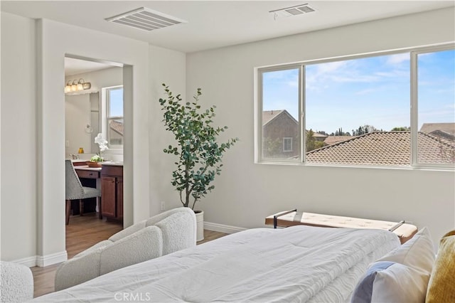11102 Duran, Jurupa Valley, CA 91752 - bedroom with visible vents, baseboards, and wood finished floors