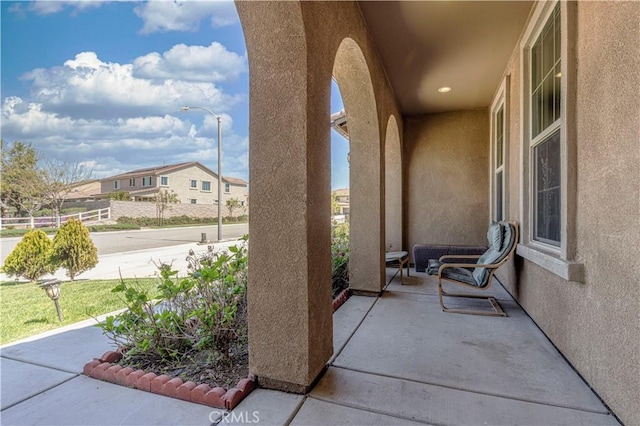 11102 Duran, Jurupa Valley, CA 91752 - view of patio / terrace with covered porch and a residential view