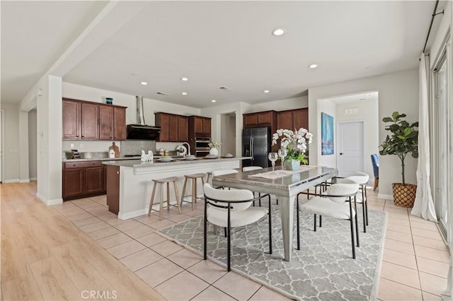 11102 Duran, Jurupa Valley, CA 91752 - dining space with recessed lighting, light tile patterned floors, and baseboards