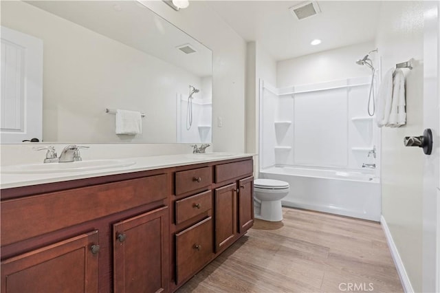 11102 Duran, Jurupa Valley, CA 91752 - full bath with a sink, visible vents, double vanity, and wood finished floors