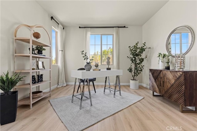11102 Duran, Jurupa Valley, CA 91752 - home office with baseboards and wood finished floors