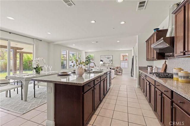 11102 Duran, Jurupa Valley, CA 91752 - kitchen with a sink, visible vents, and light tile patterned flooring