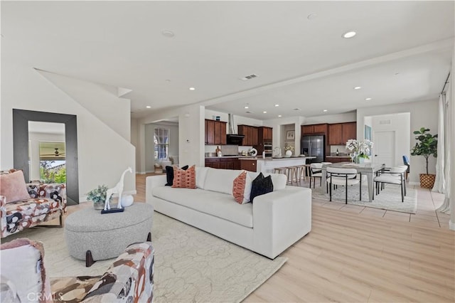 11102 Duran, Jurupa Valley, CA 91752 - living area featuring visible vents, recessed lighting, and light wood-style floors