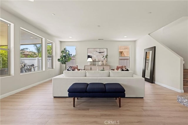 11102 Duran, Jurupa Valley, CA 91752 - living area featuring light wood-style flooring, recessed lighting, and baseboards