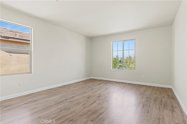 11102 Duran, Jurupa Valley, CA 91752 - empty room featuring wood finished floors and baseboards