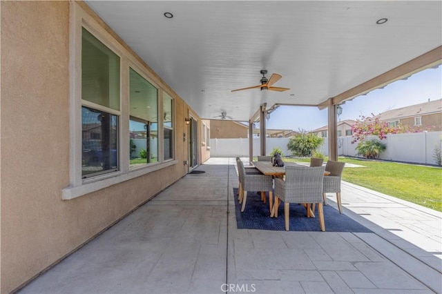 11102 Duran, Jurupa Valley, CA 91752 - view of patio / terrace featuring outdoor dining area, a fenced backyard, and a ceiling fan
