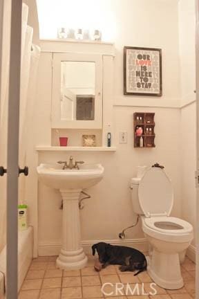 324 W 9th St, Long Beach, CA 90813 - bathroom with toilet, tile patterned floors, and baseboards