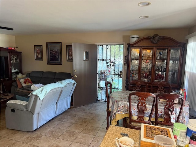 dining space featuring light tile patterned flooring