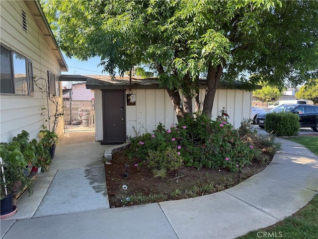 doorway to property featuring board and batten siding
