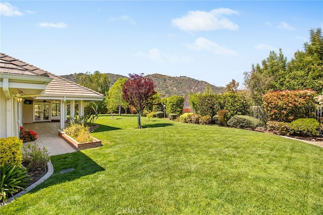 22316 Bear Creek Dr S, Murrieta, CA 92562 - view of yard featuring french doors and a mountain view
