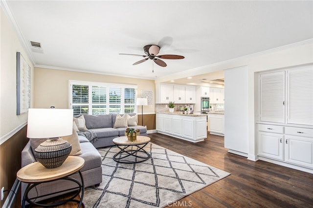 22316 Bear Creek Dr S, Murrieta, CA 92562 - living area with dark wood-style floors, a ceiling fan, crown molding, and visible vents