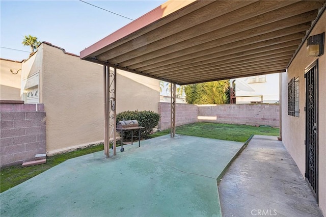 view of patio with a fenced backyard